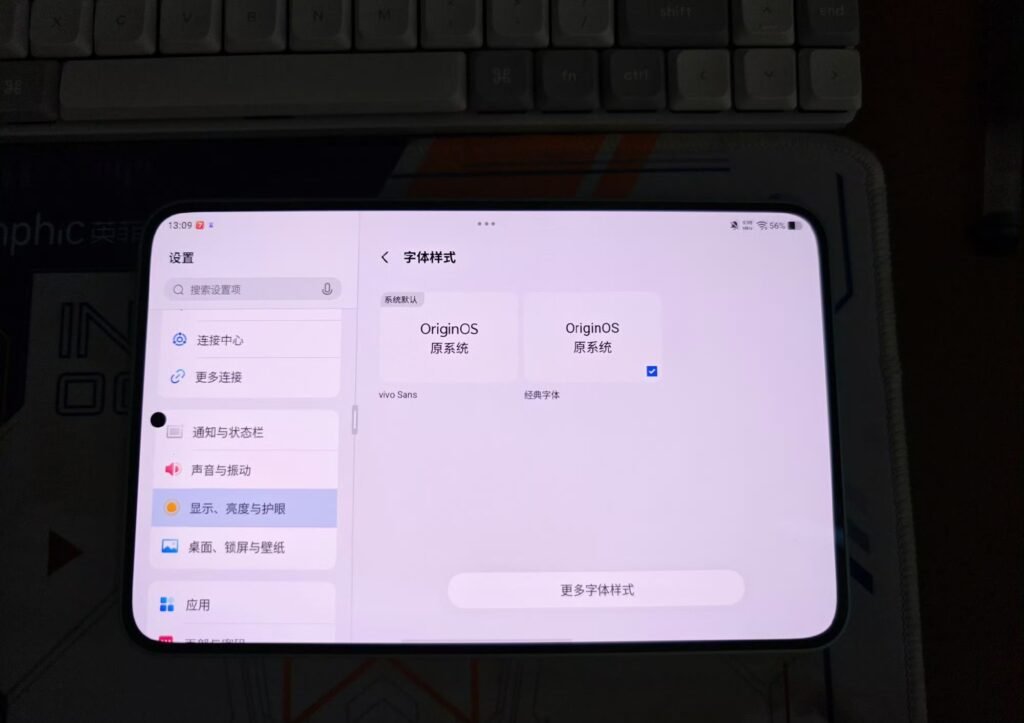 iQOO Pad Pro Hands-on: Quick Overview, Full Specs and Price 1 iQOO Pad Pro screen showing OriginOS 7 HD font‑style settings page with classic font option selected, shot above a desktop keyboard.
